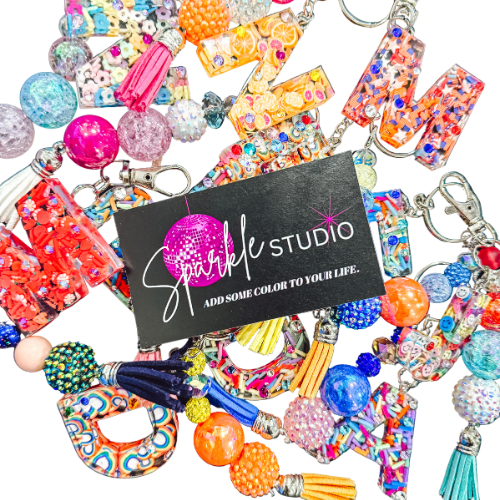 Custom resin keychain with initials and glitter charm